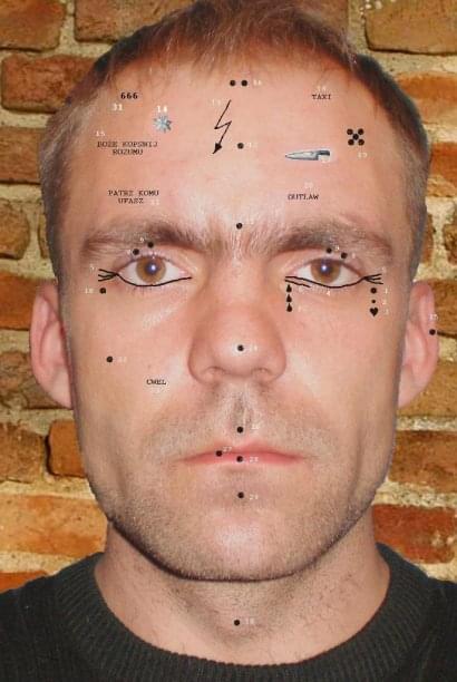The tattoos on the side of eyes or on eyelids clearly indicate excons 